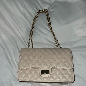 Quilted leather purse with gold chain